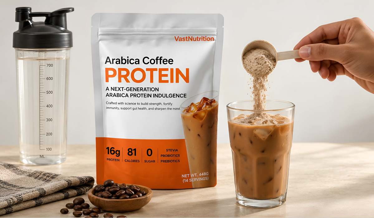 Preparing VastNutrition Arabica Coffee Protein with a scoop, shaker and iced coffee
